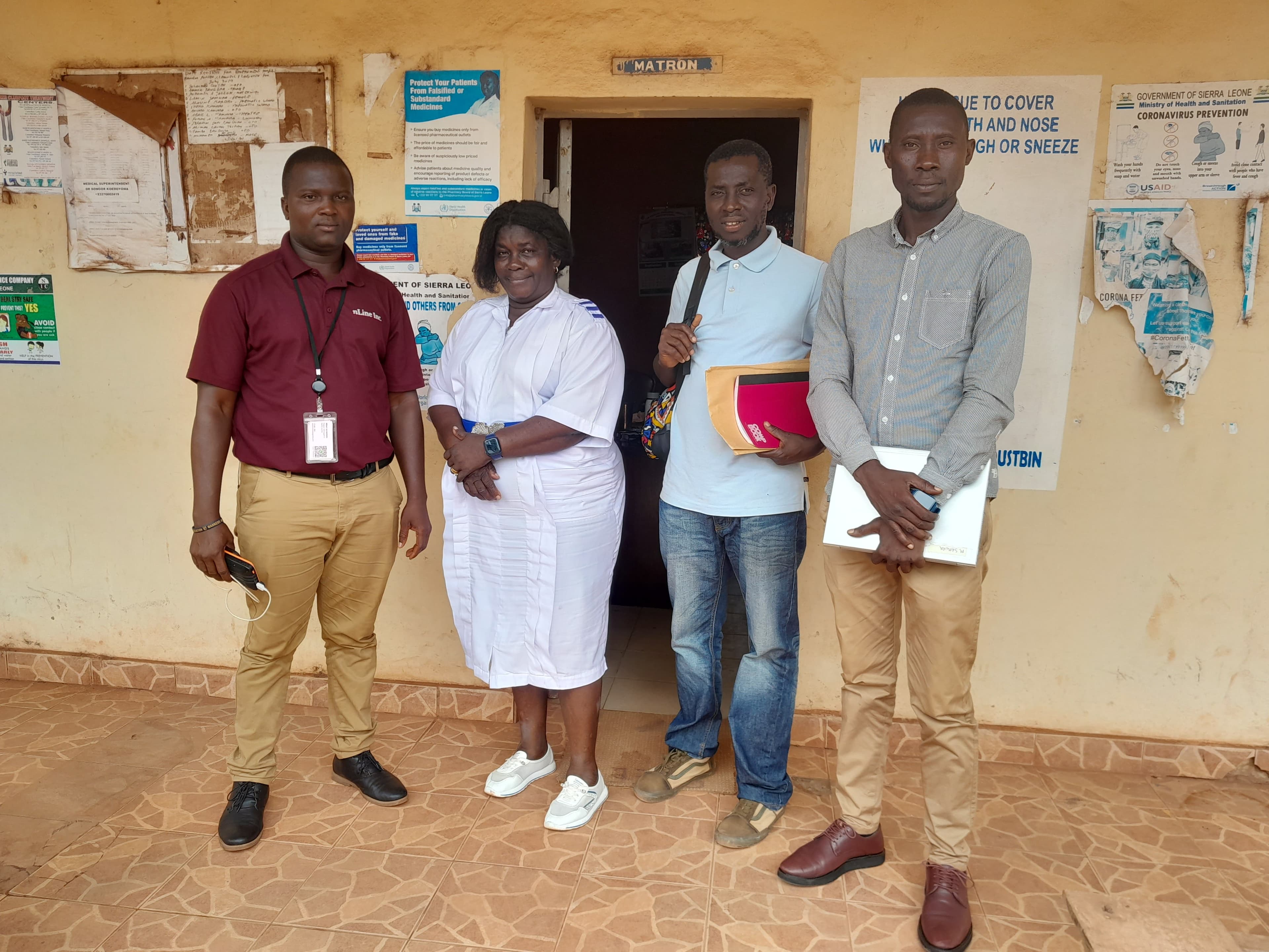nLine (far left) and Crown Agent (far right) visit Kambia Government Hospital for energy audit assessments and sensor installation. In the center are the hospital's Matron and Maintenance Officer.